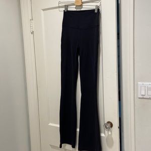 Perfect condition never worn size 8 lululemon black flared leggings